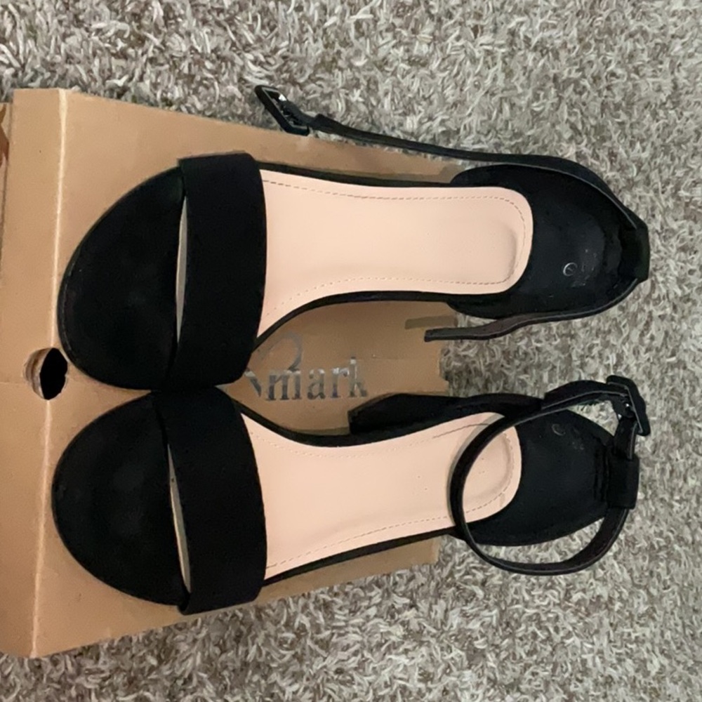 Black heels 2 inches off the floor